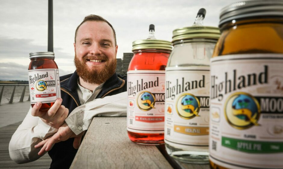 Mr Moonshine (Harris Brown) with some of his Highland Moon products.