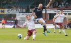 Tam O'Brien, pictured in action against Dundee last time around, will miss out for Arbroath on Saturday.
