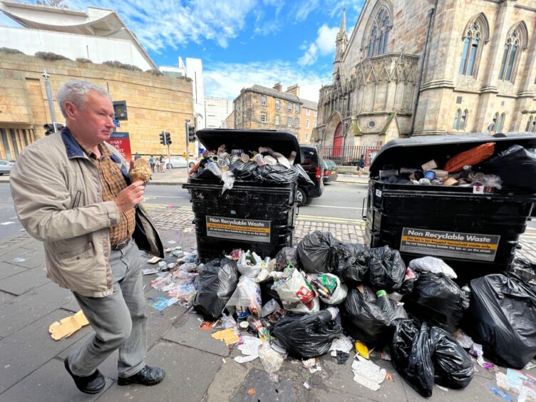 Bins overflowing in the centre of Edinburgh due to industrial action.