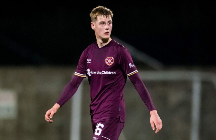 Scott McGill in action for Hearts.