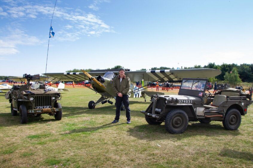 Russell Myles with his 1943 Piper L4 Cub, which was in action in Normandy.