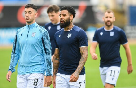 Dundee's Shaun Byrne (L) and Alex Jakubiak with Niall McGinn in the background (Image: SNS).