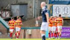 Partick Thistle celebrate after going 3-0 up at Dundee.