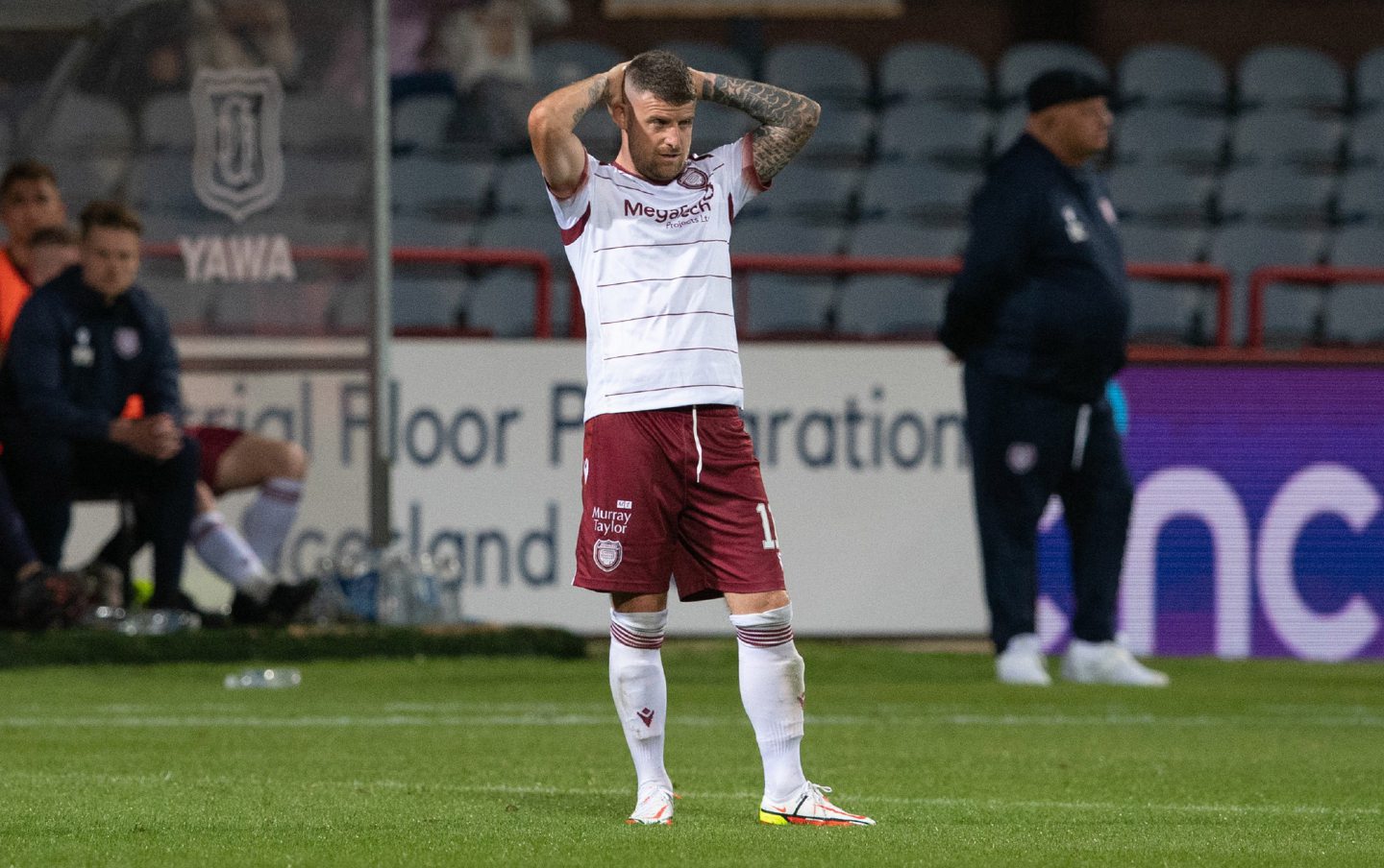 Arbroath hero Bobby Linn and boss Dick Campbell exchanged words after he was replaced on 65 minutes. Image: SNS