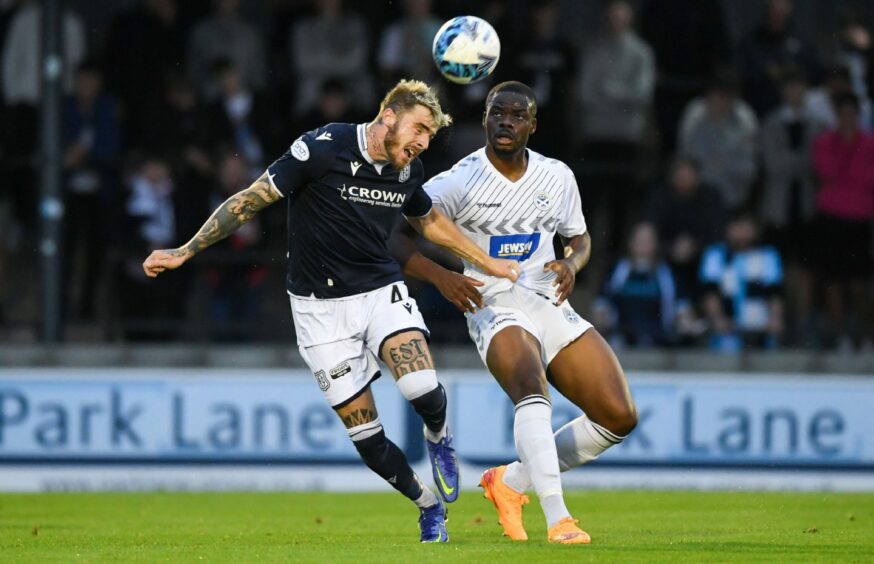 Tyler French under pressure from Ayr's Dipo Akinyemi.