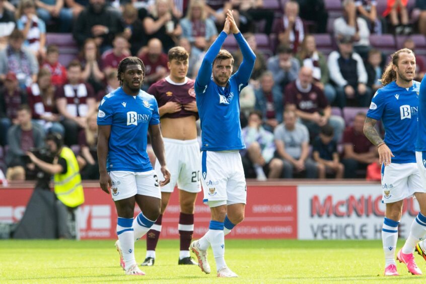 Graham Carey celebrates as he makes it 1-0 against Hearts.