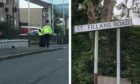 Police on St Fillans Road, Dundee, following the collision.