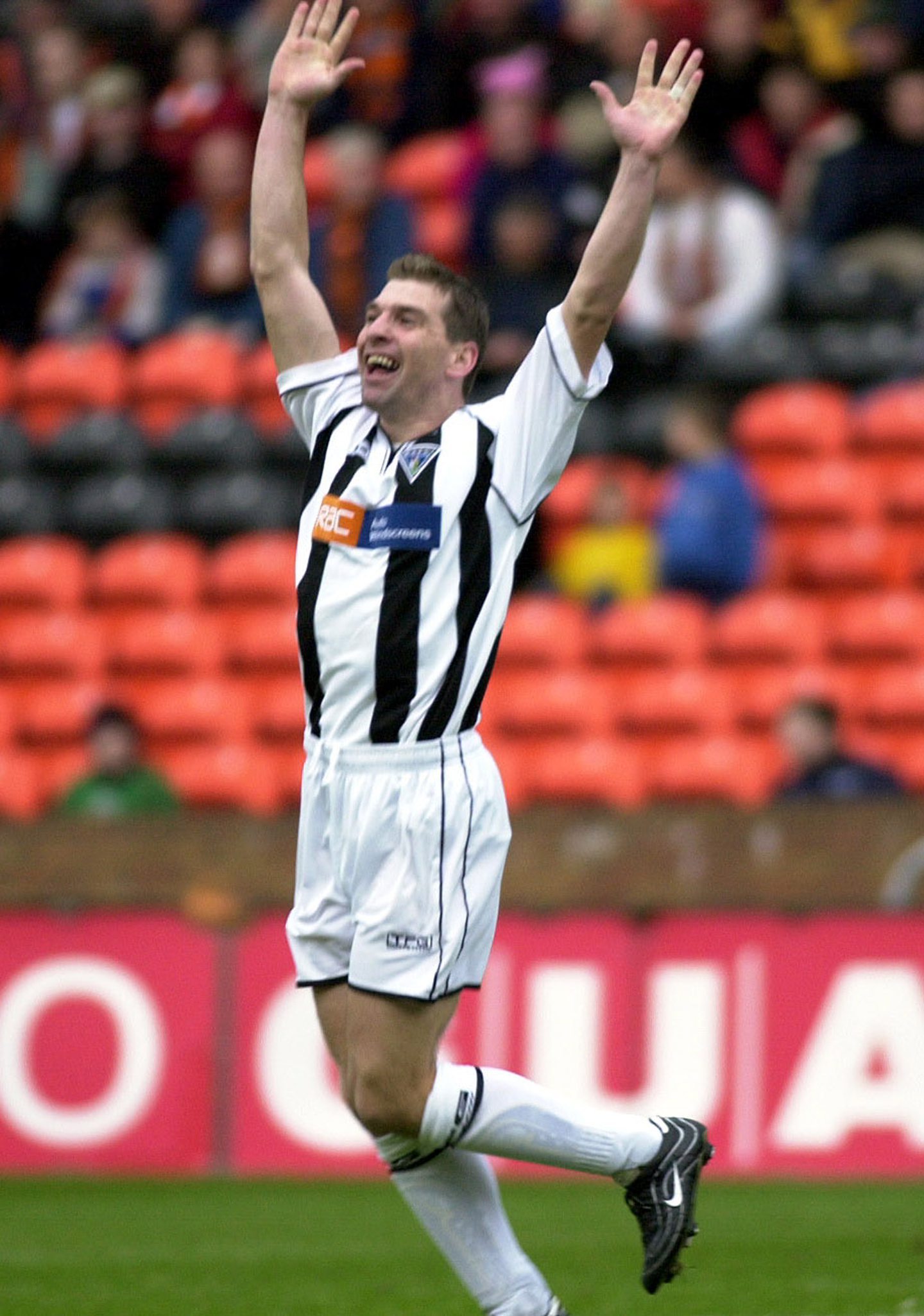 Petrie celebrates another goal for Dunfermline against United - this time in 2001.