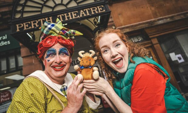 Barrie Hunter (Lettie Lou) and Kirsty Findlay (Jack) in costume with props outside Perth Theatre