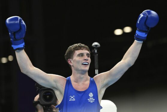 Sam Hickey celebrates his Commonwealth Games semi-final win.