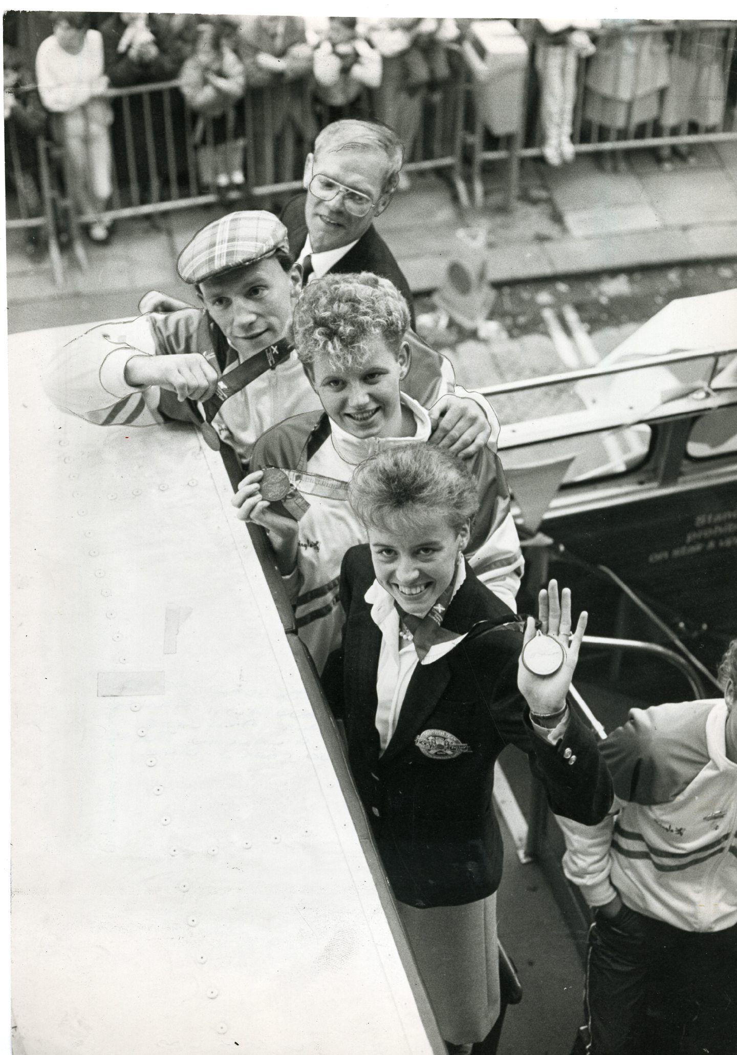 The open-top bus parade through Dundee in 1986. Front to back: Liz Lynch, swimmer Ruth Gilfillan, boxer George Ferrier and boxing coach Dick McTaggart.