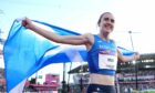 Scotland's Laura Muir celebrates winning bronze.