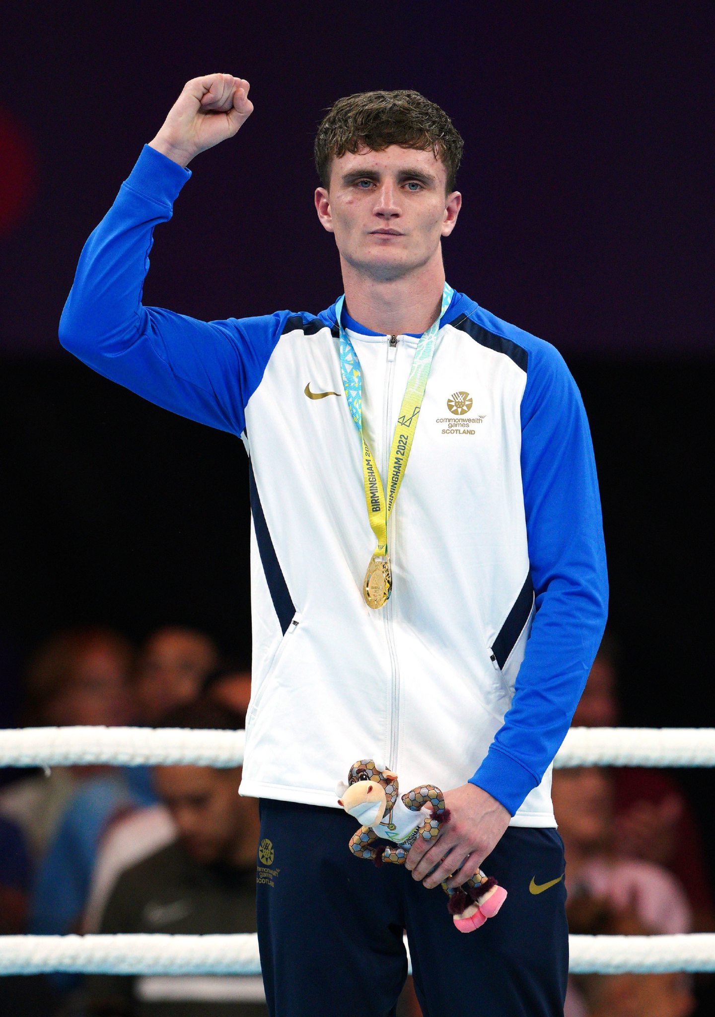 Sam Hickey proudly stands with his gold medal in Birmingham.