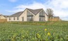 unique home built in the middle of a field