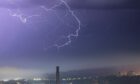 Lightning over Cox's stack in Dundee. Photo: Paul Vinova.