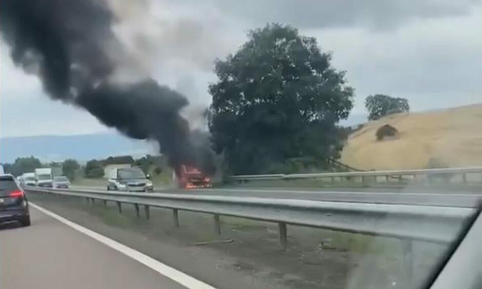 The car fire on the M90 near Perth.