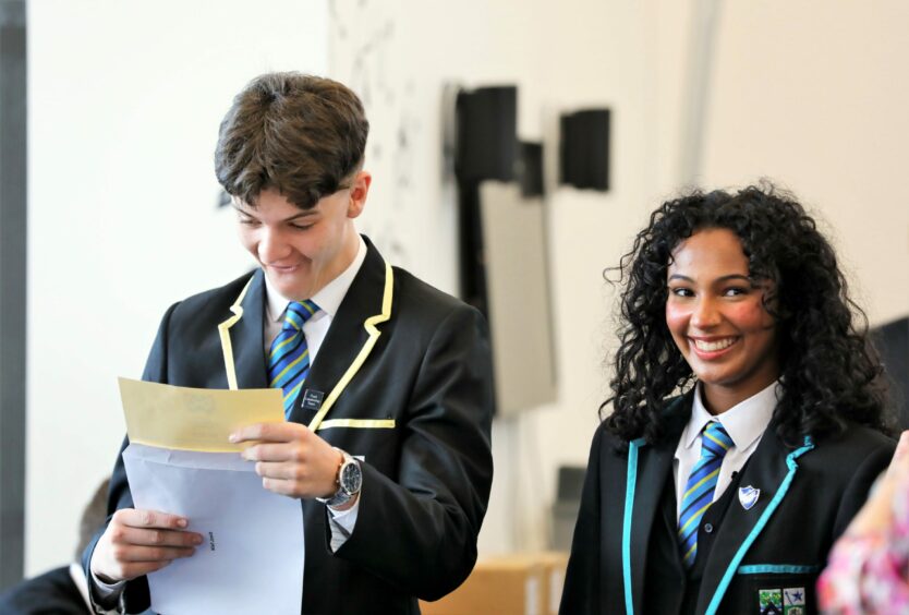 Niall Jowitt and Aaliyah McLaine with their results