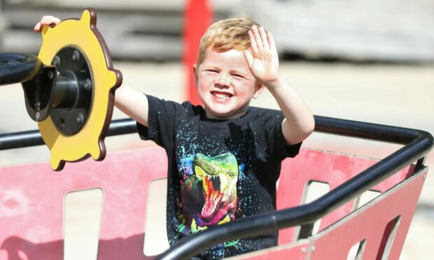 Hunter Barnard, 5, from Broughty Ferry enjoying the sunshine at Camperdown Park in Dundee on Tuesday.