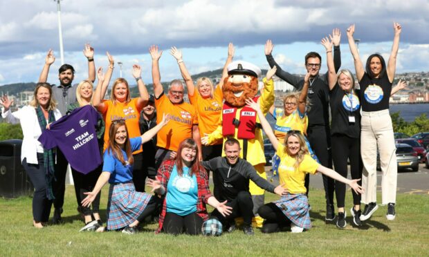 Representatives of some of the charities benefiting from Dundee Kiltwalk met up with event organisers at point on the route near the Tay Road Bridge. Pictures by Gareth Jennings / DCT Media.