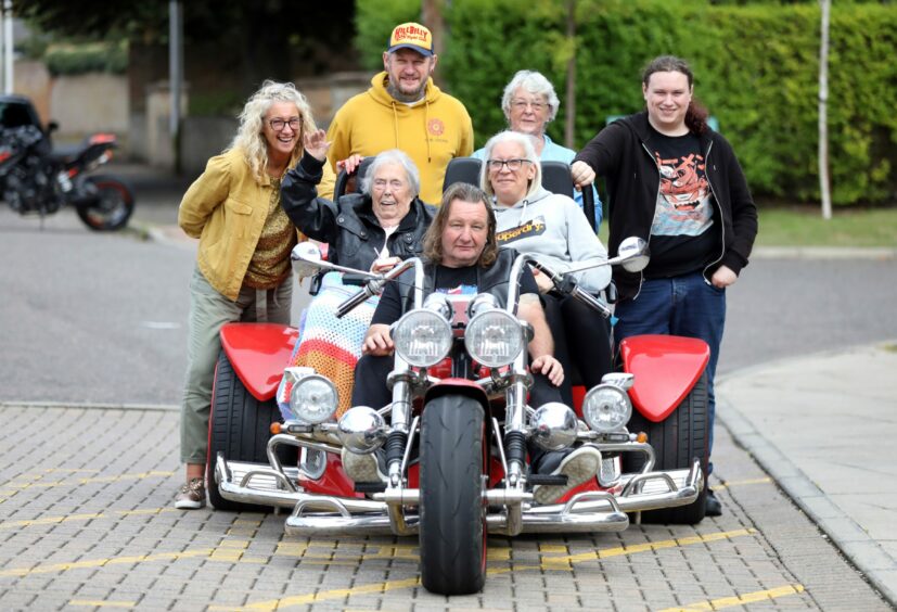 Kit gets set to ride with relatives including granddaughter Kerry Jones, who joined her on the journey.