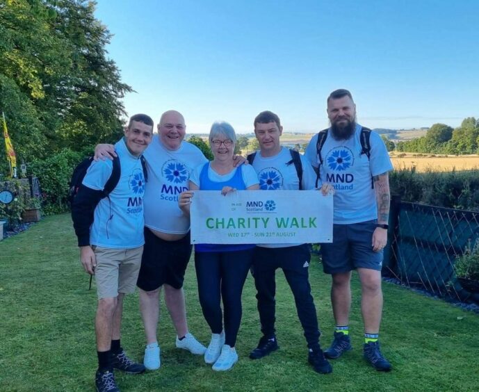 Steven and Yvonne Pert with sons Paul, John and Sean at the start of the trek for MND Scotland.