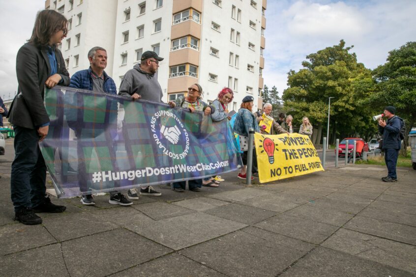 A protest about poverty outside Lochee Community Larder earlier this year. 