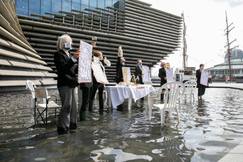 Extinction Rebellion protesters staged a tea party protest outside the V&amp;A Dundee to draw attention to rising sea levels. Kim Cessford / DCT Media.