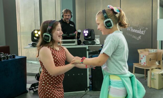 Amelia Henderson (7) and Summer Wishart (8) in the silent disco.