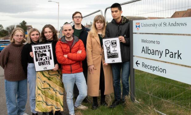 Members of Campaign for Affordable Student Housing (CASH) outside the demolished Albany Park student accommodation in St Andrews.