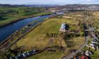 aerial view of Morris Leslie's West Kinfauns site showing existing HQ and land next to river Tay