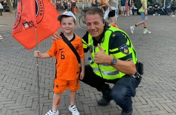 Dundee United fan Lucas, 6, hailed a ‘legend’ for leading Amsterdam clean-up