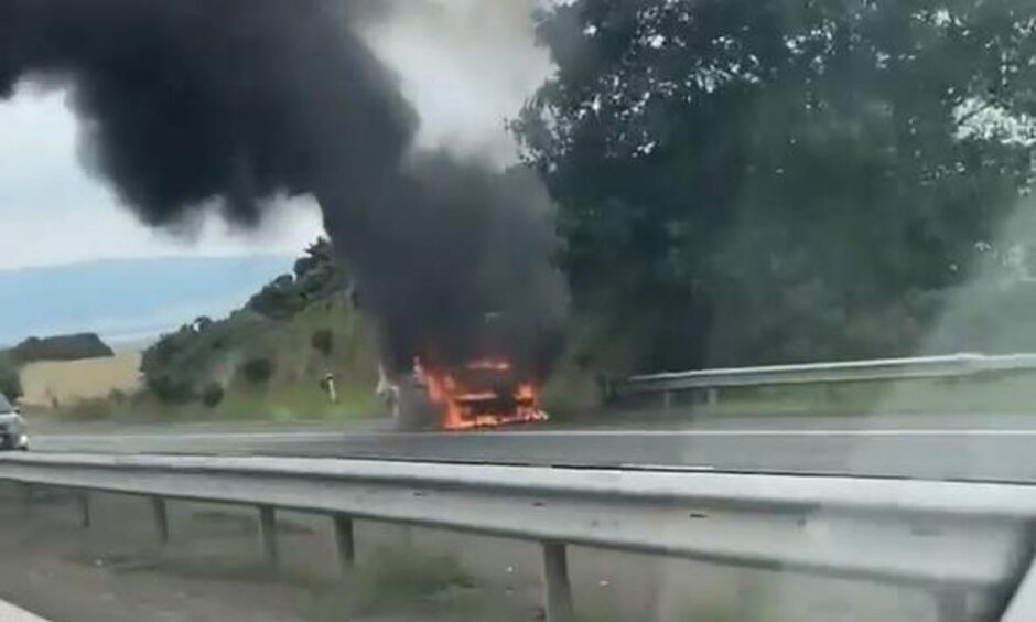 A car fire on the M90 near Perth.