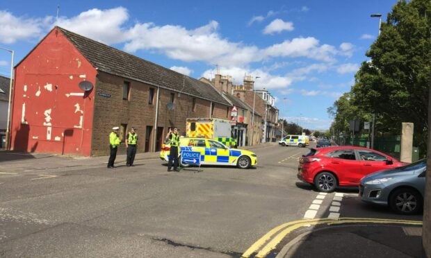 Police closed a section of North Esk Road following the crash. Picture: Ian Shewan