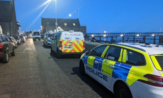 Emergency services at the Broughty Ferry lifeboat station after a woman was rescued from the River Tay.