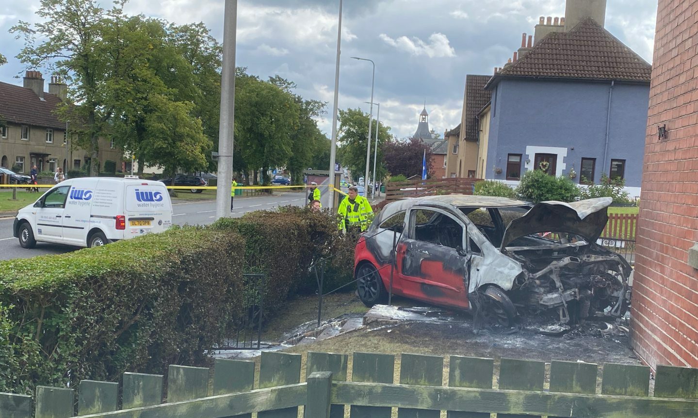 Car crashes into Rosyth house and catches fire