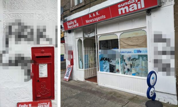 Racist graffiti was spray painted on the shop front.