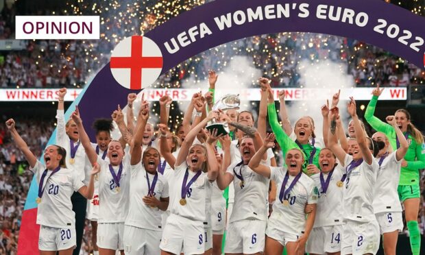 The Lionesses celebrate the UEFA cup.