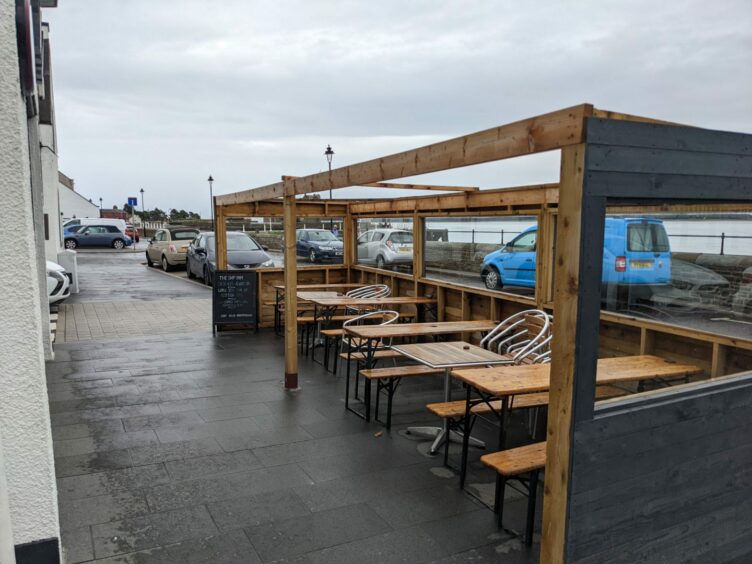 The Ship Inn has already removed the roof of its outside seating area on orders from the council.