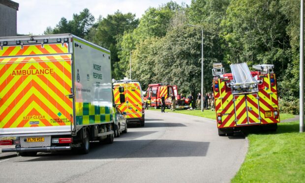 The emergency services on Ancrum Court in Glenrothes on Sunday afternoon.