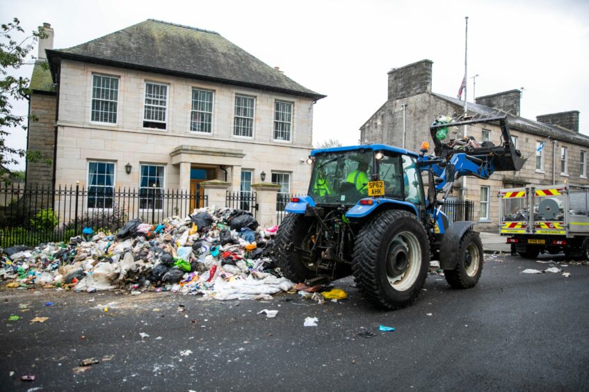 Fife Council is attempting to recover the pile of rubbish outside Kirkcaldy Police Station.