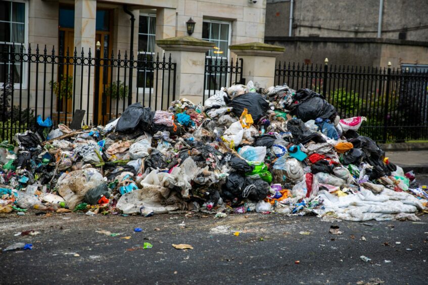 A large pile of rubbish has been left on the side of the road outside Kirkcaldy Police Station.