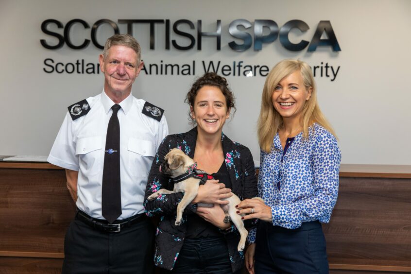 Chief Super Intendant Mike Flynn, The then Minister for Rural Affair, Mairi Gougeon and Chief Exec Kirsteen Campbell with Bella the Pug in 2018.