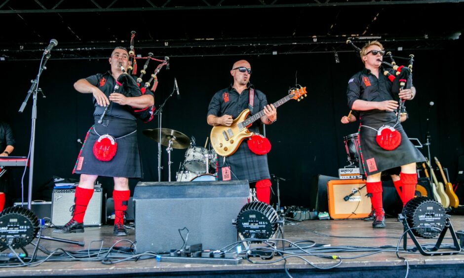 Red Hot Chilli Pipers rocked the Coal Carrying Championship, Kelty.