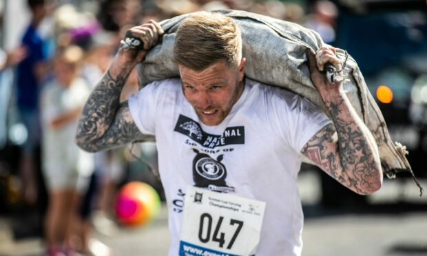 This competitor showed grim determination as he tackled the course.