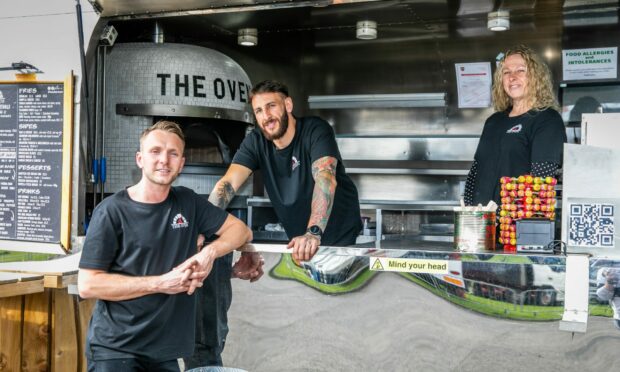 From left: Marc Wheelen with his friend Dillon McEwen and Dillon's mum Andrea McEwen are the owners of Leven's pizza truck The Oven Airstream.