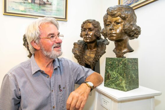 Friends of William Lamb studio chairman Norman Atkinson with the bronze of the young Elizabeth