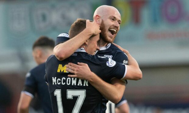 Dundee striker Zak Rudden celebrates with Luke McCowan against Arbroath.