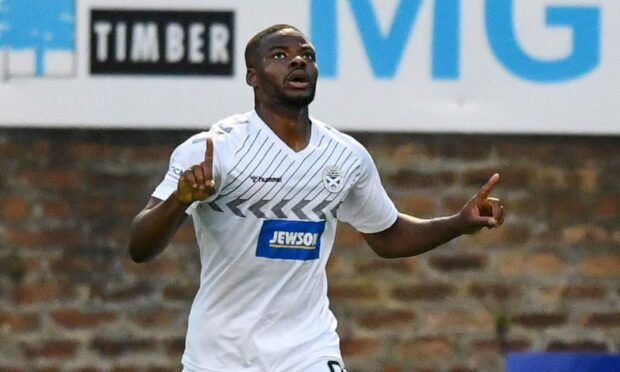 Ayr's Dipo Akinyemi celebrates a goal against Dundee. Image: SNS.