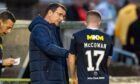 Dundee boss Gary Bowyer has a word with Luke McCowan as he limps off at Ayr United.