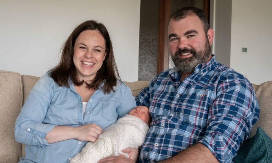 Kate Forbes with husband and baby